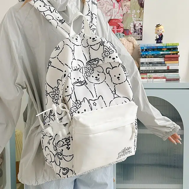 南潇湘 小清新休闲高颜值精美小狗涂鸦潮版韩版背包初高中生大学上课百搭 尼龙 双肩包 男女同款情侣款 多色