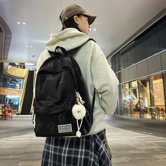 南潇湘 百搭防水纯色简约小清新初中生高中生大学生上课书包反光蝴蝶休闲背包 尼龙 双肩包 男女同款情侣款 黑色/绿色/米色/粉色/蓝色