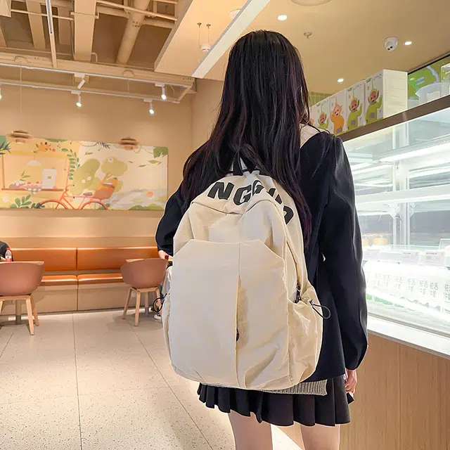 南潇湘 字母印花轻便简约大容量运动耐磨背包初中生高中生大学生上课百搭书包 尼龙 双肩包 男女同款情侣款 白色/灰色/黑色/绿色