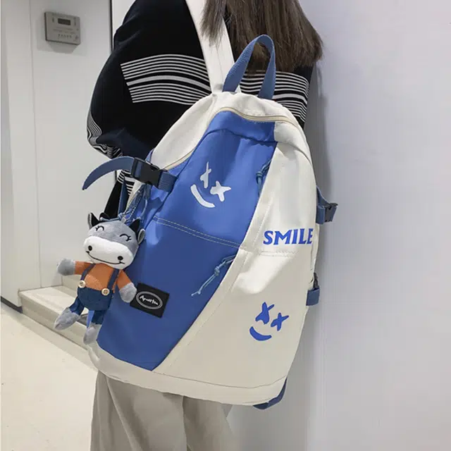 南潇湘 撞色系轻便百搭背包洋气个性气质高级感潮流时尚初中高中大学上课 尼龙 双肩包 男女同款情侣款 白色/黑色