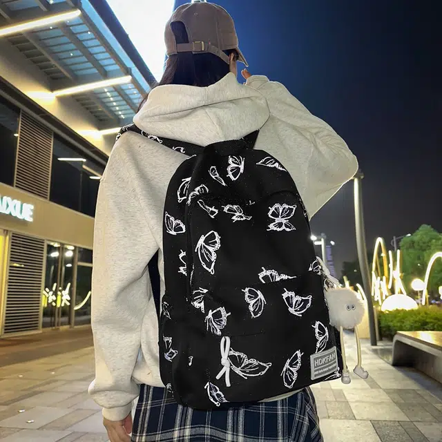 南潇湘 百搭防水纯色简约小清新初中生高中生大学生上课书包反光蝴蝶休闲背包 尼龙 双肩包 男女同款情侣款 黑色/绿色/米色/粉色/蓝色