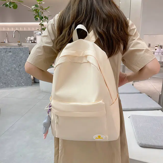 南潇湘 小清新休闲高颜值精美潮版韩版高颜值女生背包初高中生大学生上课百搭书包 尼龙 双肩包 常规 男女同款情侣款 米白色/浅绿色