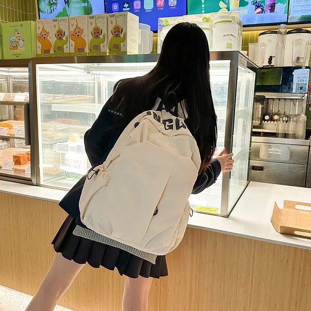 南潇湘 字母印花轻便简约大容量运动耐磨背包初中生高中生大学生上课百搭书包 尼龙 双肩包 男女同款情侣款 白色/灰色/黑色/绿色