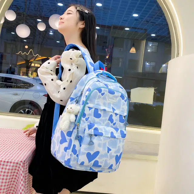 南潇湘 小清新休闲高颜值精美潮版韩版背包初中生高中生大学生上课百搭书包 尼龙 双肩包 男女同款情侣款 蓝色/黑色/紫色/粉色