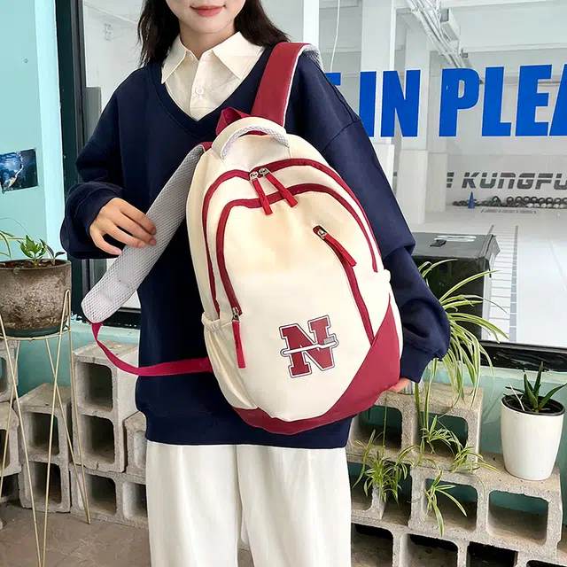 南潇湘 撞色系轻便百搭背包个性气质高级感潮流时尚初中高中大学生上课书包 尼龙 双肩包 男女同款情侣款 红色/蓝色/红配蓝/黑色