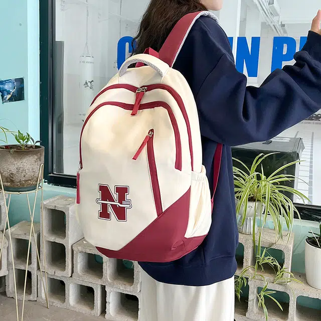 南潇湘 撞色系轻便百搭背包个性气质高级感潮流时尚初中高中大学生上课书包 尼龙 双肩包 男女同款情侣款 红色/蓝色/红配蓝/黑色