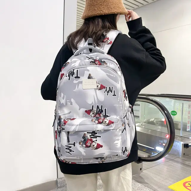南潇湘 小清新休闲高颜值精美潮版韩版背包初中生高中生大学生上课百搭书包 尼龙 双肩包 男女同款情侣款 灰色/蓝色/黑色
