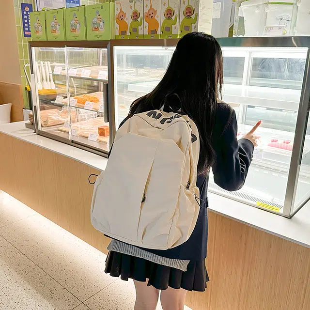 南潇湘 字母印花轻便简约大容量运动耐磨背包初中生高中生大学生上课百搭书包 尼龙 双肩包 男女同款情侣款 白色/灰色/黑色/绿色