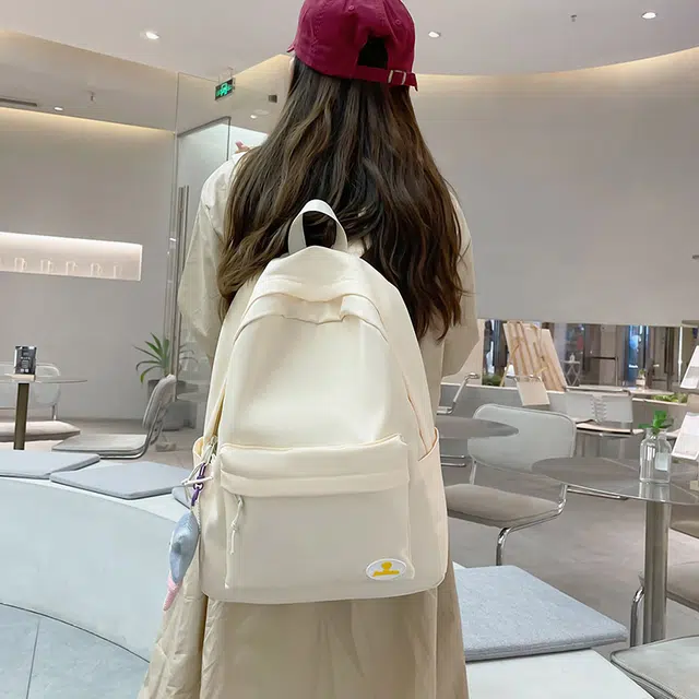 南潇湘 小清新休闲高颜值精美潮版韩版高颜值女生背包初高中生大学生上课百搭书包 尼龙 双肩包 常规 男女同款情侣款 米白色/浅绿色