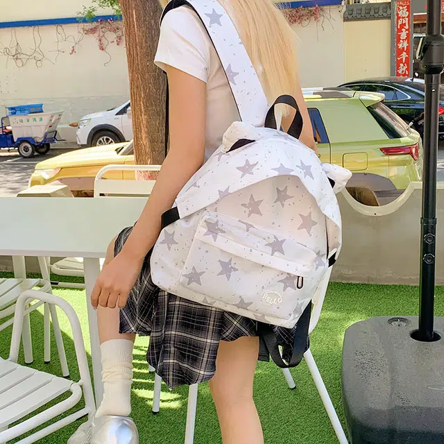 南潇湘 小清新休闲高颜值精美潮版韩版背包初中生高中生大学生上课百搭书包 尼龙布 双肩包 男女同款情侣款 白色星星/白色豹纹