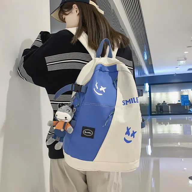 南潇湘 撞色系轻便百搭背包洋气个性气质高级感潮流时尚初中高中大学上课 尼龙 双肩包 男女同款情侣款 白色/黑色