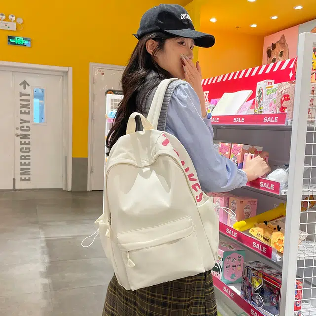 南潇湘 小清新休闲高颜值韩版背包初中高中大学上课百搭 尼龙 双肩包 男女同款情侣款 多色