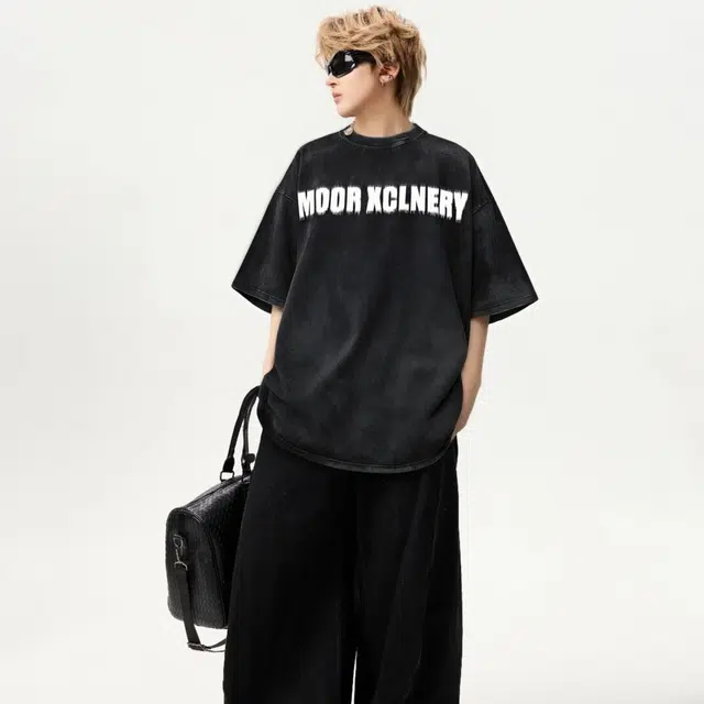 MOOR XCLNERY logoT