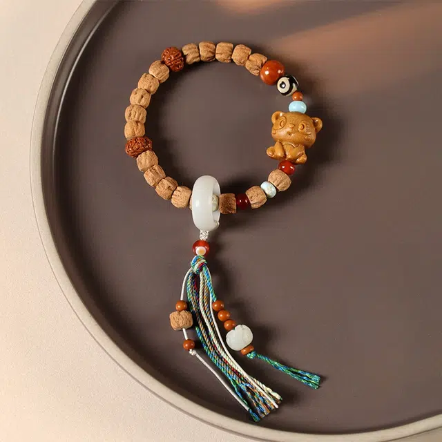 茂琼 吉祥如意新中式国潮时尚复古设计潮流百搭百民族风格配饰可爱小熊藏式流苏挂件 柏香籽/百香籽 菩提类手串 女款