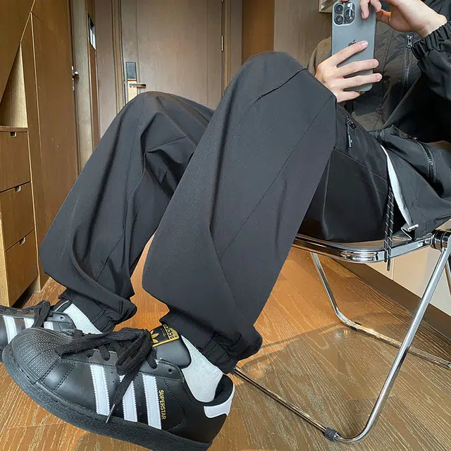 一碗士多 美式高街小众个性时尚运动户外登山跑步简约舒适贴身轻便直筒裤斜切拉链设计机能防风防水速干束脚感百搭宽松休闲裤 男女同款