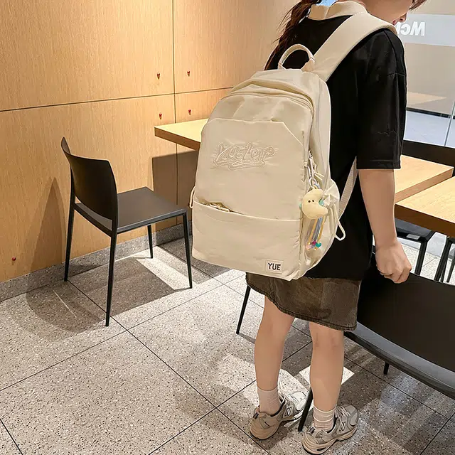 天才小熊 超大容量书包女初中生减负高中生 小学生轻便背包 经典时尚小众设计 高级感 休闲拉链开合  尼龙布 双肩包 常规 米白色