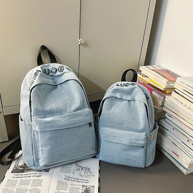 天才小熊 初中生书包女生高中学生超大容量背包 小 经典时尚小众设计 高级感 休闲拉链开合 牛仔布 双肩包 大号 浅蓝色