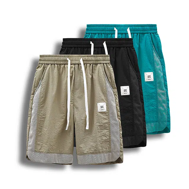太子龍 夏季网眼冰丝拼接运动男速干弹力透气五分裤松紧腰沙滩裤休闲短裤 男款