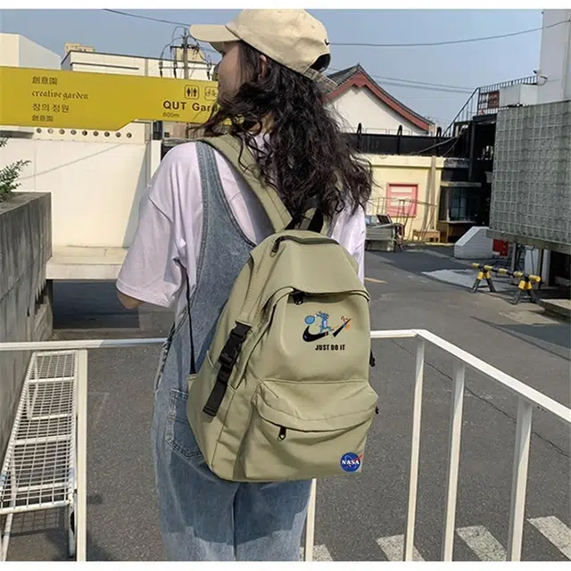 米囹 学院风书包 轻盈减负 双肩包 大号 黑色