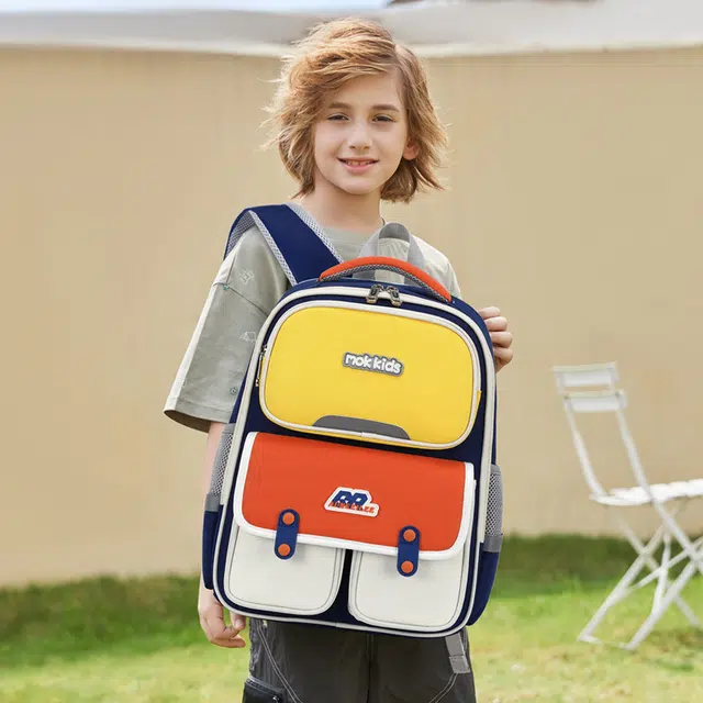 米囹 英伦时尚书包 轻盈减负 双肩包 大号 黄配红