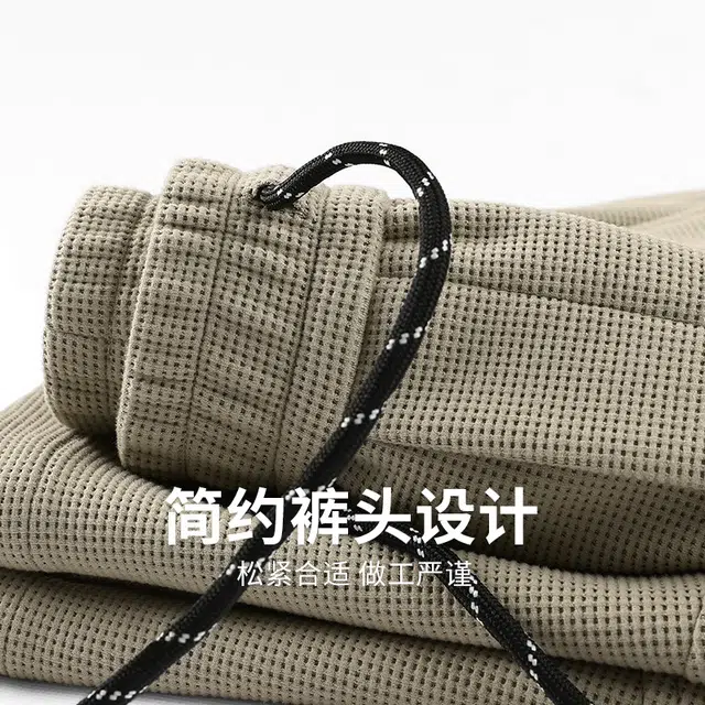 与狼共舞 轻薄透气亲肤弹力纯色简约百搭松紧腰五分休闲短裤 男款