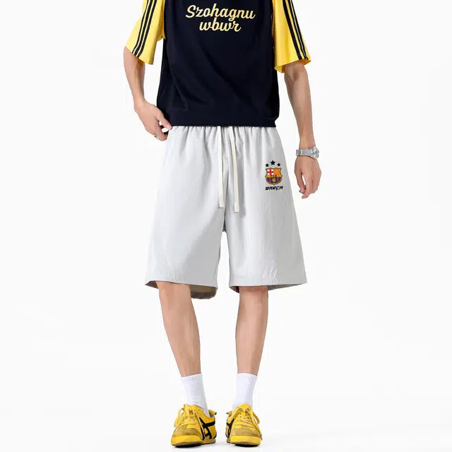 巴塞罗那足球俱乐部 队徽字母印花拼接解构设计透气网孔薄款五分裤宽松百搭时尚休闲短裤 男女同款