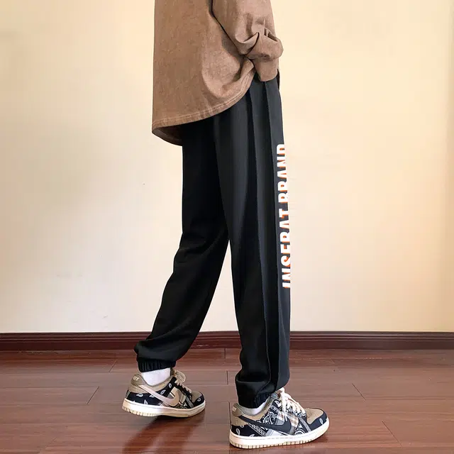 左岸 青少年港风帅气潮流字母印花卫裤宽松柔软舒适透气束脚裤垂感轻便哈伦长裤春秋休闲裤 男款