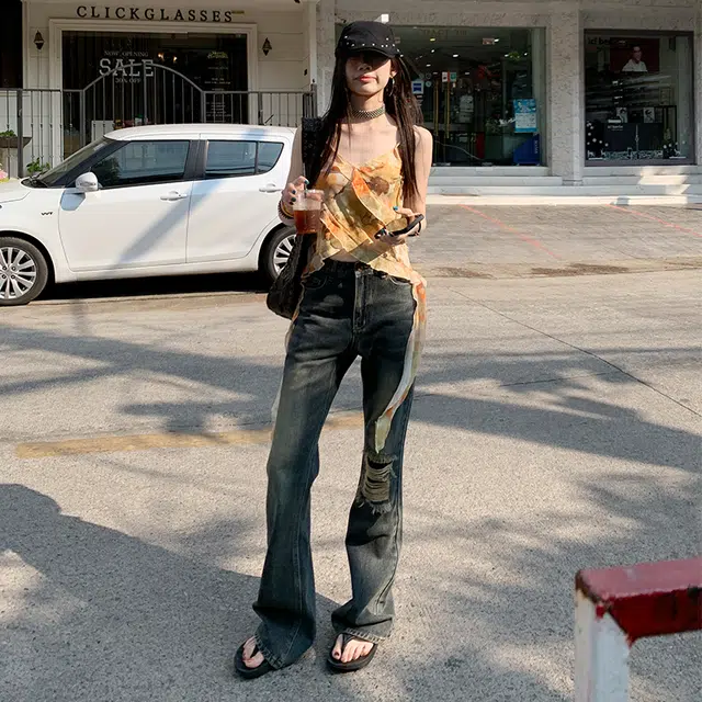 玫丝朵 美式复古酷飒破洞流苏设计时尚百搭喇叭牛仔裤 女款