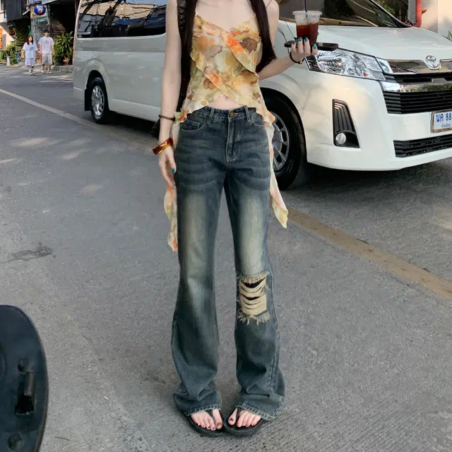 玫丝朵 美式复古酷飒破洞流苏设计时尚百搭喇叭牛仔裤 女款
