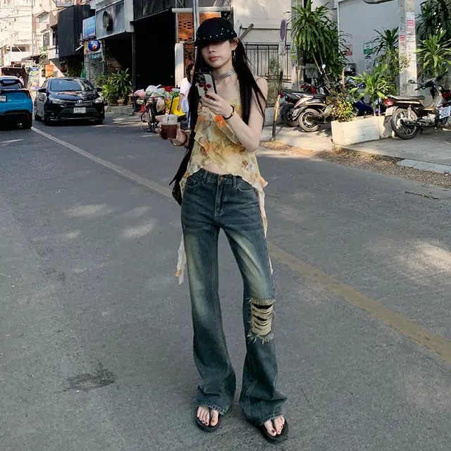 玫丝朵 美式复古酷飒破洞流苏设计时尚百搭喇叭牛仔裤 女款