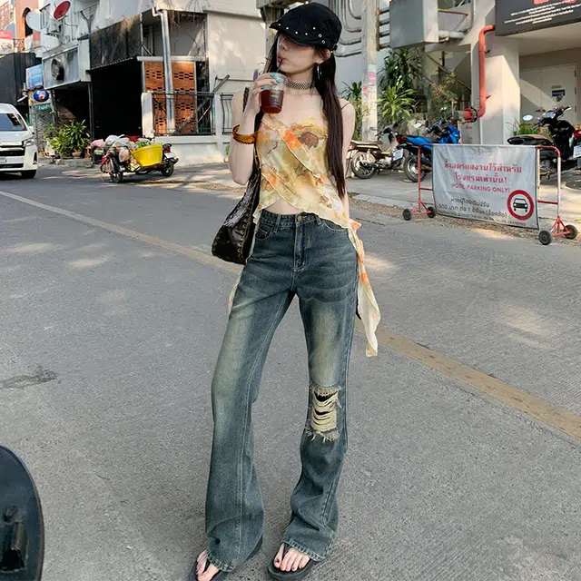玫丝朵 美式复古酷飒破洞流苏设计时尚百搭喇叭牛仔裤 女款