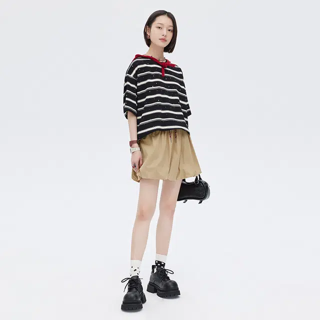 SHUEN T
