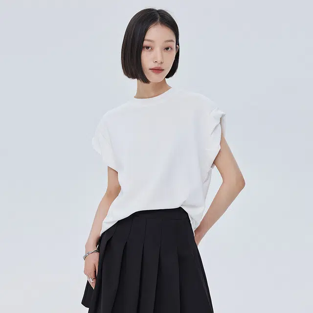 SHUEN T