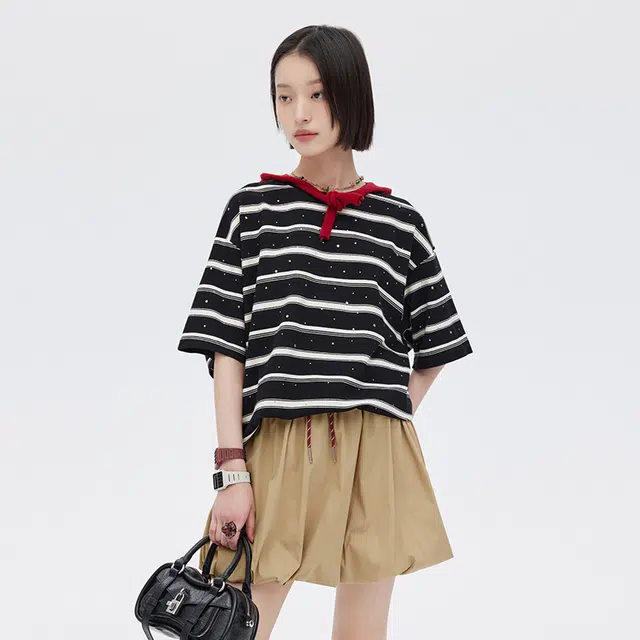 SHUEN T
