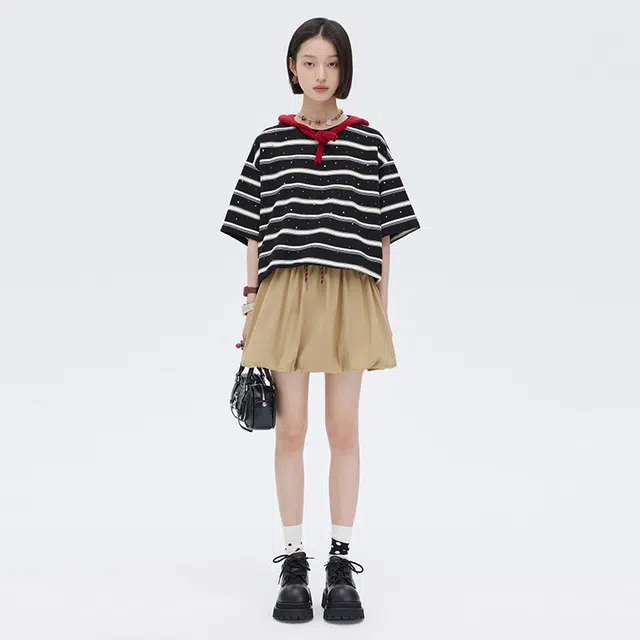 SHUEN T