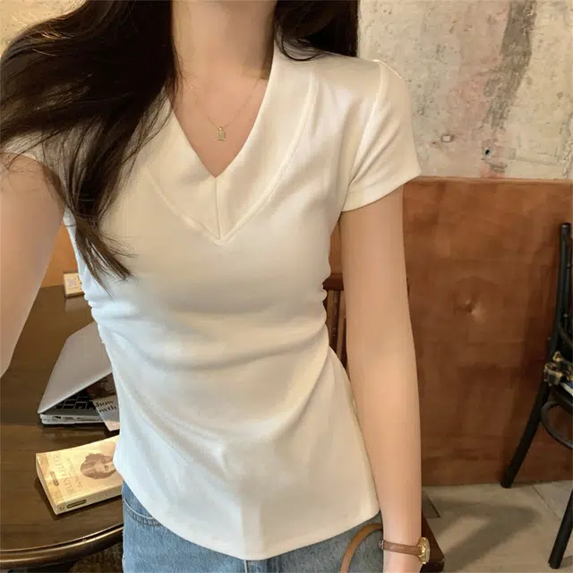V T