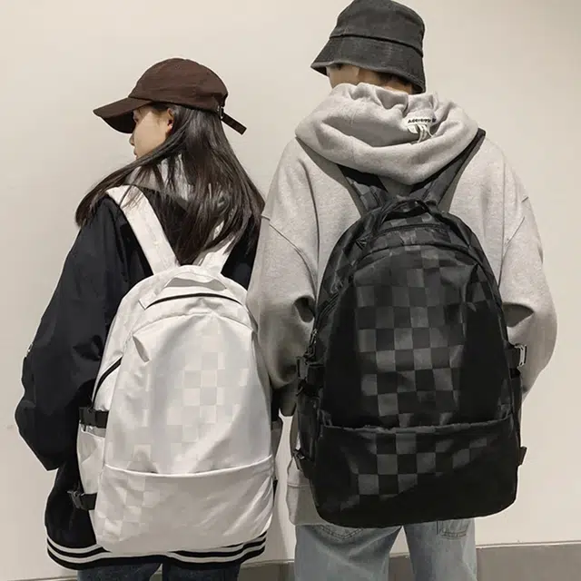 维多利亚旅行者 潮牌棋盘格通勤上课旅游大容量简约款 尼龙 双肩包背包书包 男女同款情侣款 黑白棋盘格