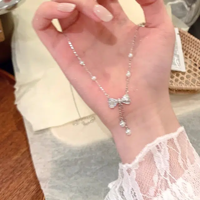 韵系 甜美精致蝴蝶结流苏仿珍珠高级感小众设计颈链 锆石 项链 女款
