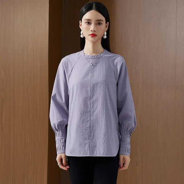 杭依阁 拼接宽松时尚纯色灯笼袖长袖圆领衬衫 女款