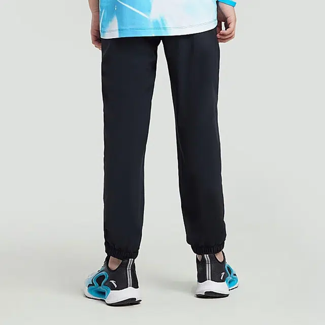 安踏儿童 弹弹裤 纯色中腰透气束脚针织运动裤 儿童款 梦幻黑