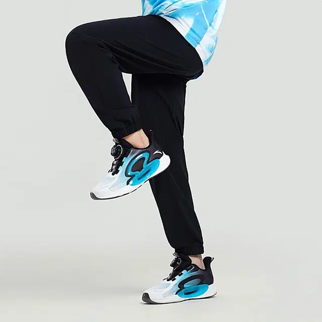 安踏儿童 弹弹裤 纯色中腰透气束脚针织运动裤 儿童款 梦幻黑