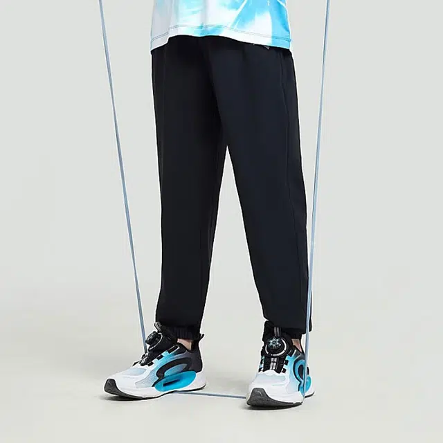 安踏儿童 弹弹裤 纯色中腰透气束脚针织运动裤 儿童款 梦幻黑