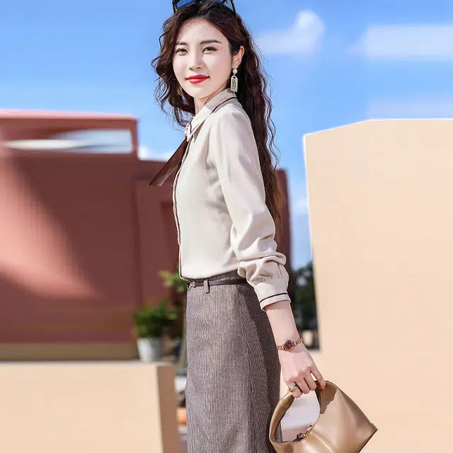唐娜姿兰 纯色尖领纽扣时尚职业长袖衬衫 女款