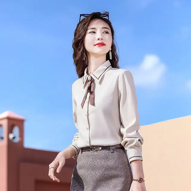 唐娜姿兰 纯色尖领纽扣时尚职业长袖衬衫 女款