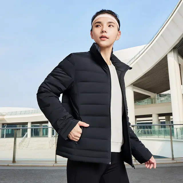 鸿星尔克 无缝充绒工艺系列 纯色立领保暖羽绒服外套 女款 正黑