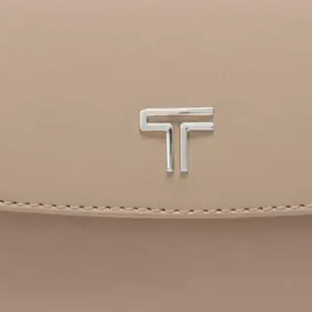 TUMI
