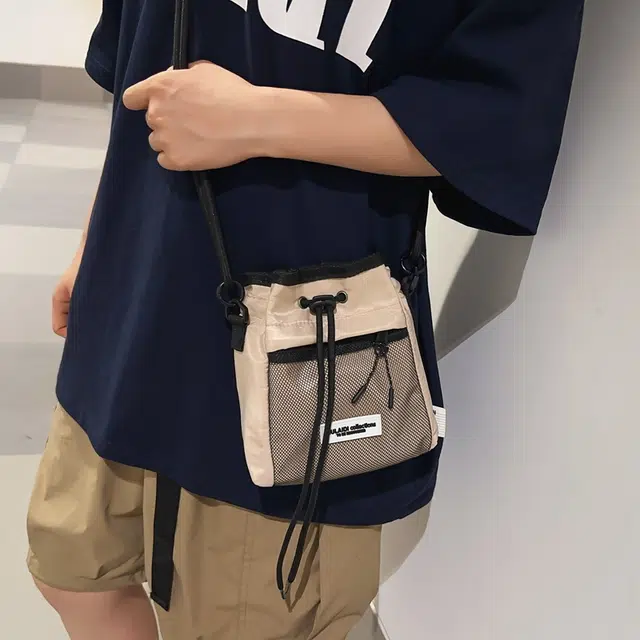 醇龙 潮牌休闲时尚抽绳学生 尼龙 斜挎包 男女同款情侣款 多色