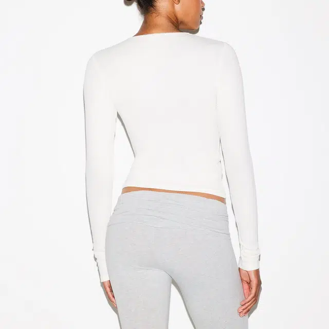 SKIMS DROP NEEDLE POINTELLE LONG SLEEVE TOP FW25T
