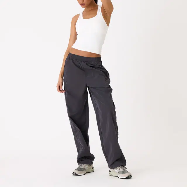 KITH SS25 Azariah Seamed Track Bottoms logo
