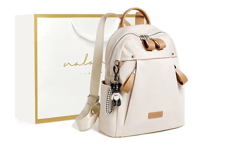 纳兰杜 大容量通勤简约百搭轻便学生党上课出游 织物拼合成革 双肩包 大号 女款 米白拼杏/子夜黑